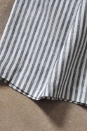 Uniform pleated dress, sleeveless, light stripes linen