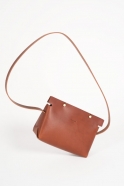 The shoulder strap triangle bag, brown leather