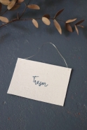 Embroided words "Trésor"