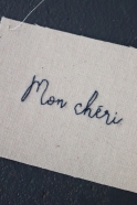 Embroided words "Mon chéri"