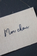 Embroided words "Mon chou"