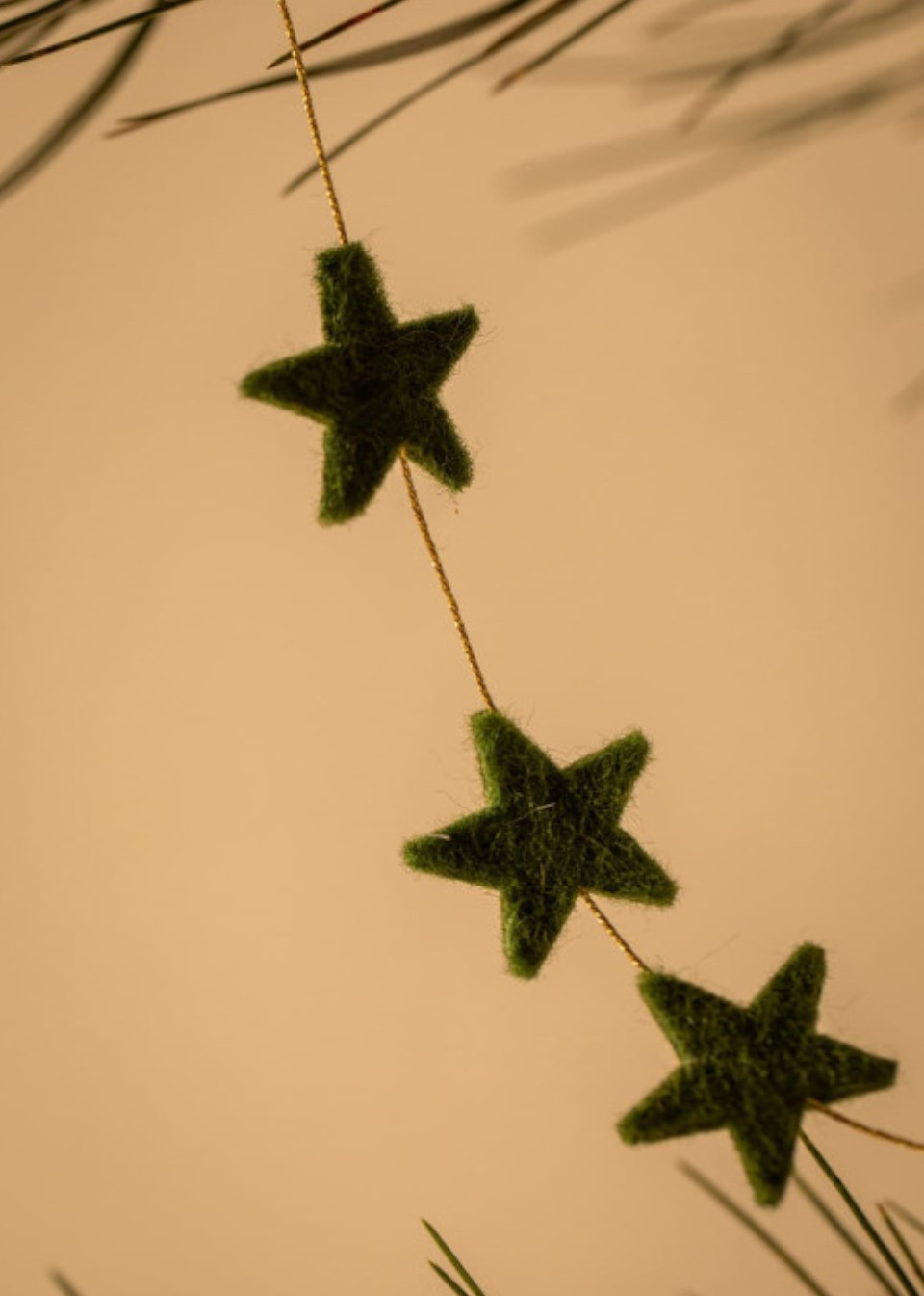 Olive green stars felted garland - MUSKHANE